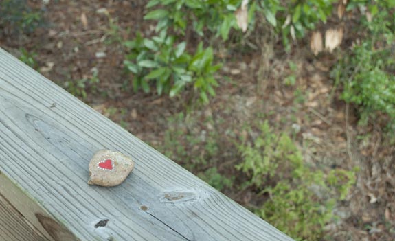leave rocks with hearts and messages on the back for strangers to find