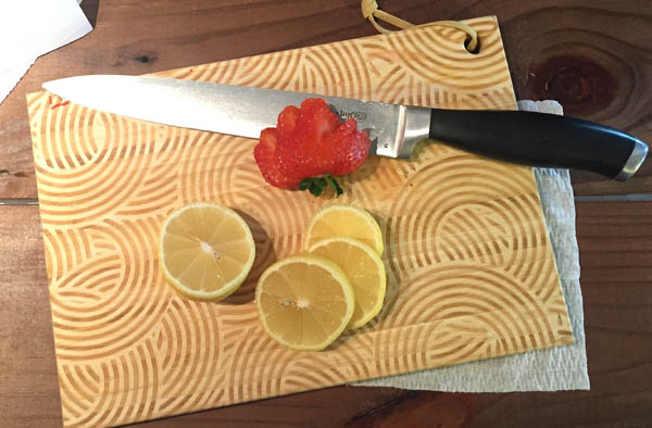 place a wet paper towel under your cutting board to keep it from slipping